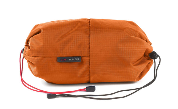 An Aeronaut 45 Travel Laundry Stuff Sack in Sangria (red with light red grid) 210 Cerylon.